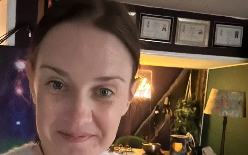 Jo smiling at home
